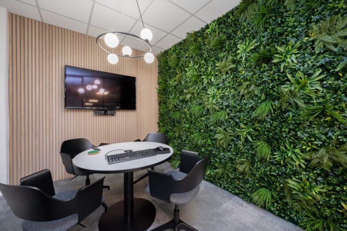 Meeting room with nature wall and timber cladding