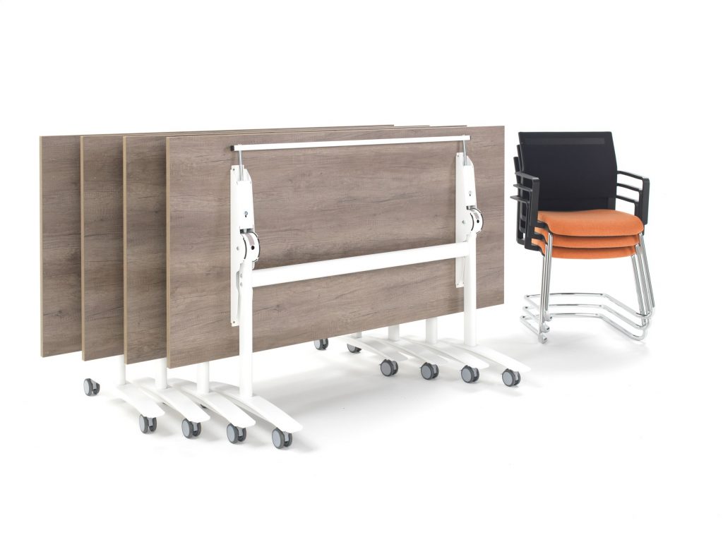 Rearrangeable meeting room furniture. Meeting tables that flip up for space saving